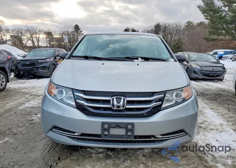 2014 Honda Odyssey Lx z USA, uszkodzony, nr VIN 5FNRL5H27EB098096